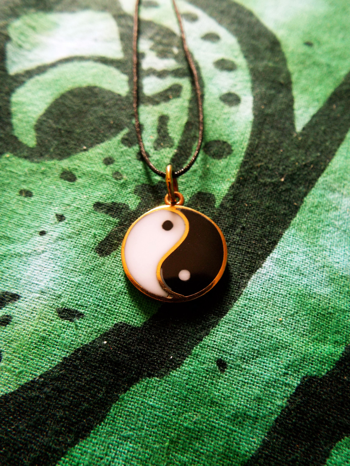 Bronze outlined yinyang yin yang sign with hand and claw pendant necklace